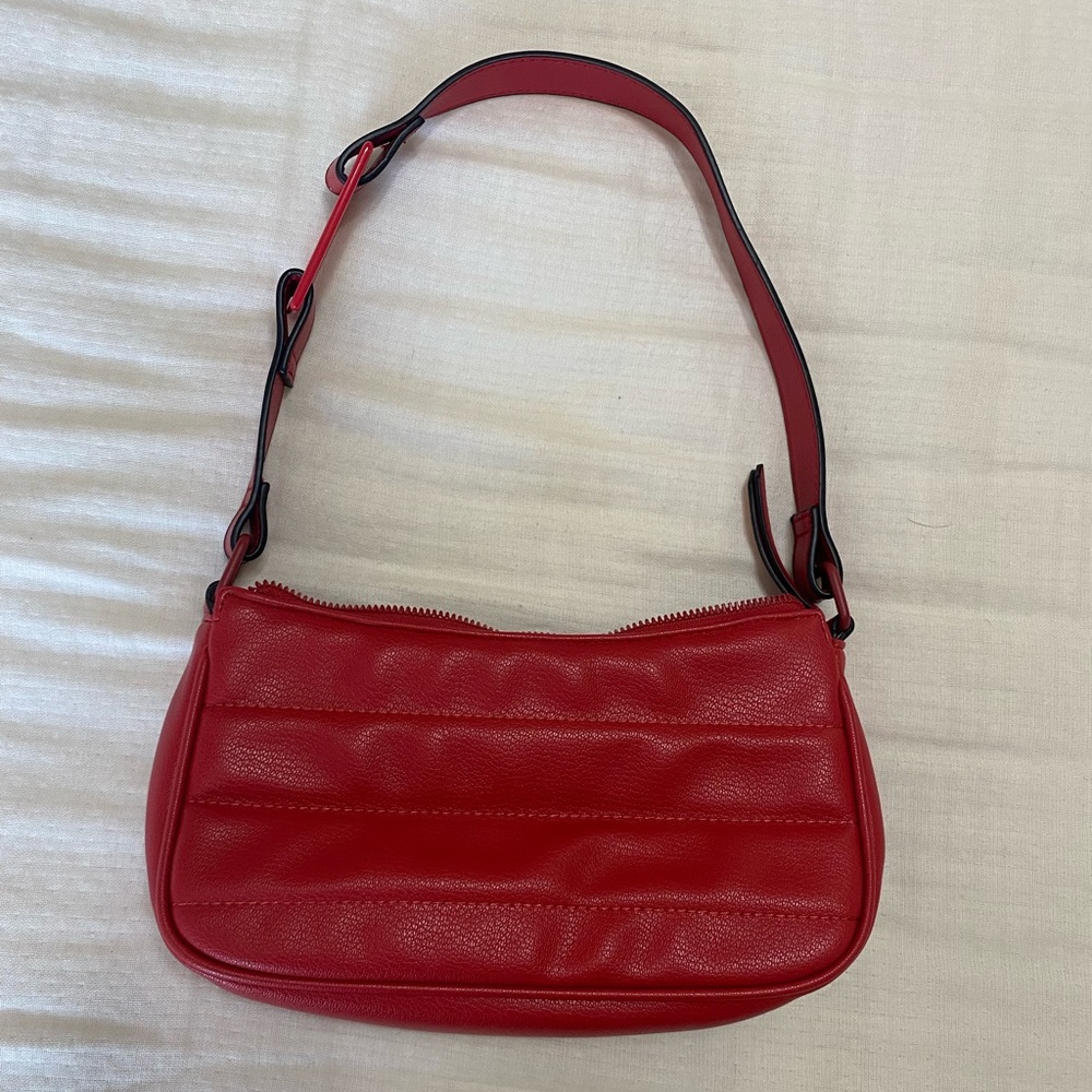 Small red shoulder bag